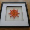 Quilled pink and orange mandala